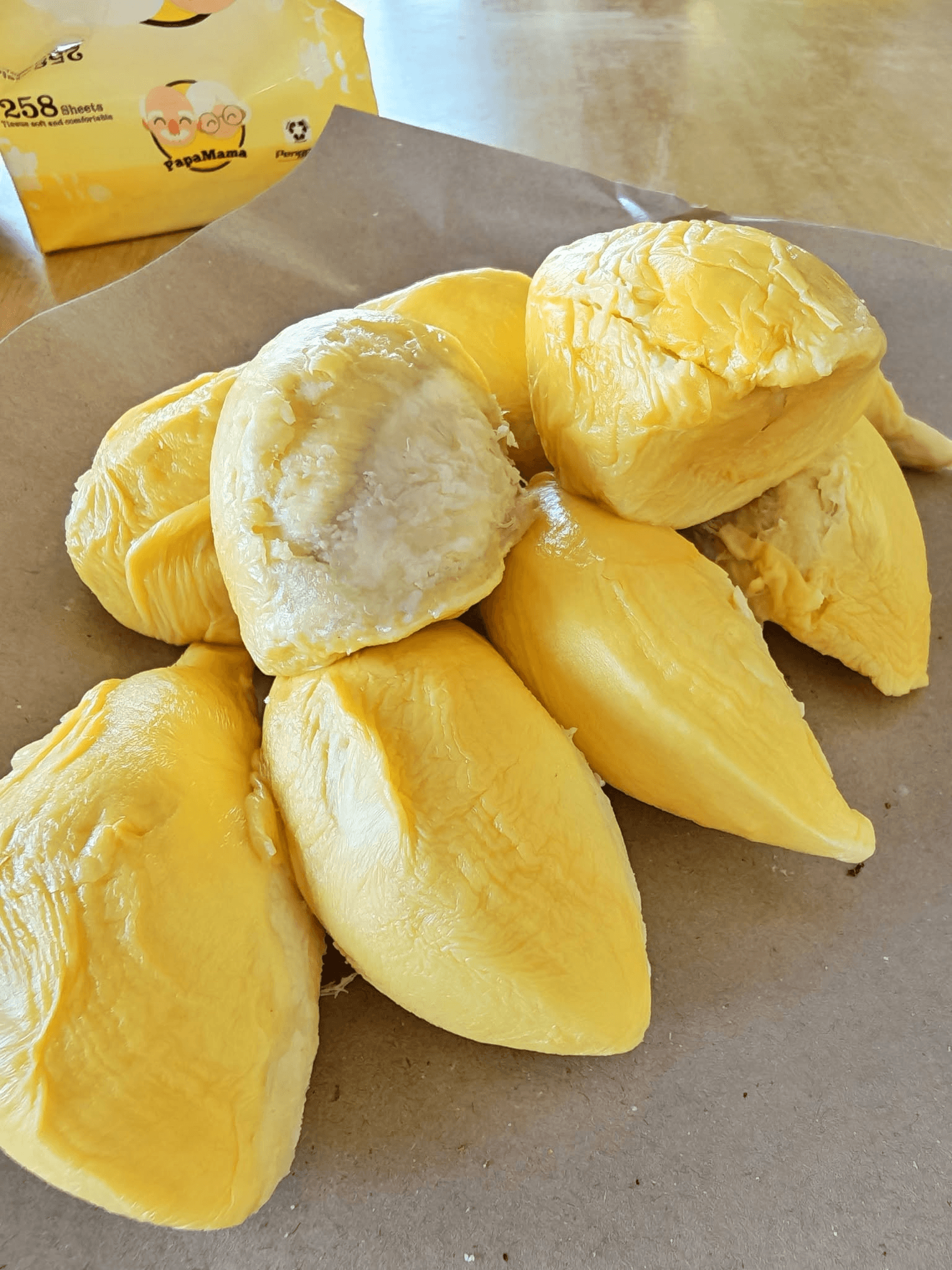 A generous spread of golden durian pieces ready to taste.